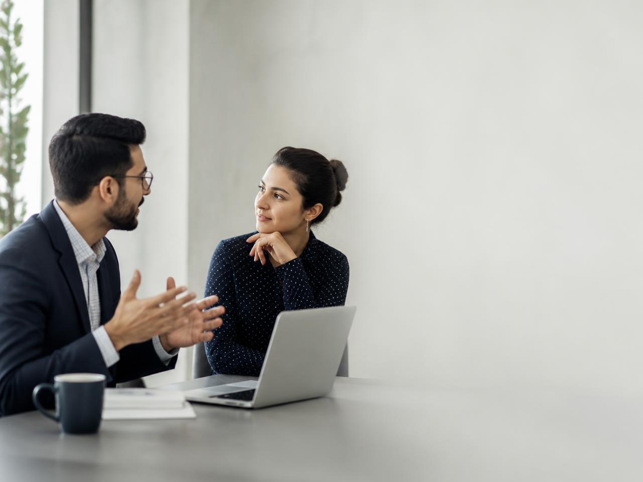 Two colleagues in a career development conversation